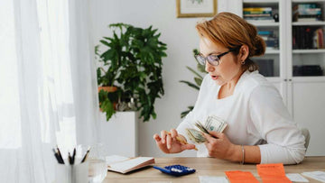 Woman calculating money